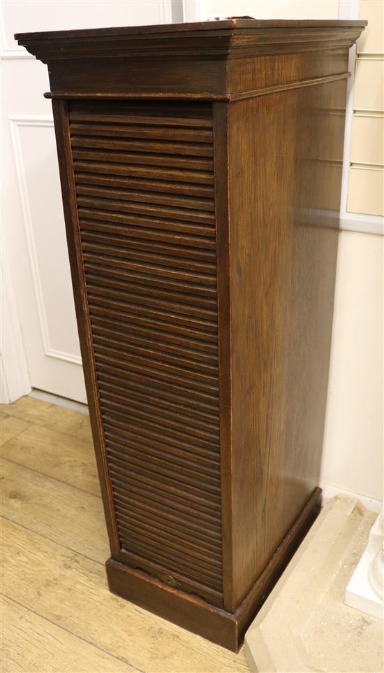 A Lebus oak tambour front filing cabinet